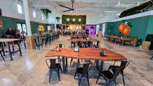 Inside of Hogan Yards featuring Orchid Island Brewery and Pepper & Salt BBQ