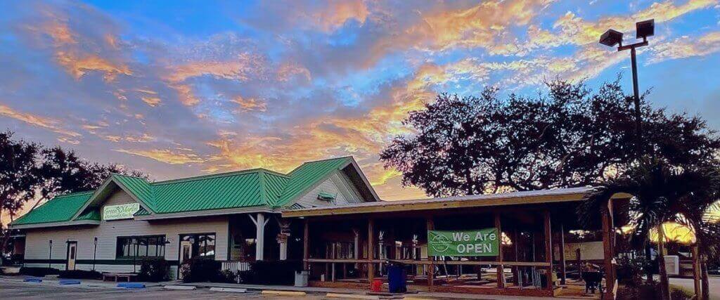 The Green Marlin outside with a beautiful sky in the background