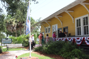 Vero Beach Railroad station grand reopening as people walk through the front doors.