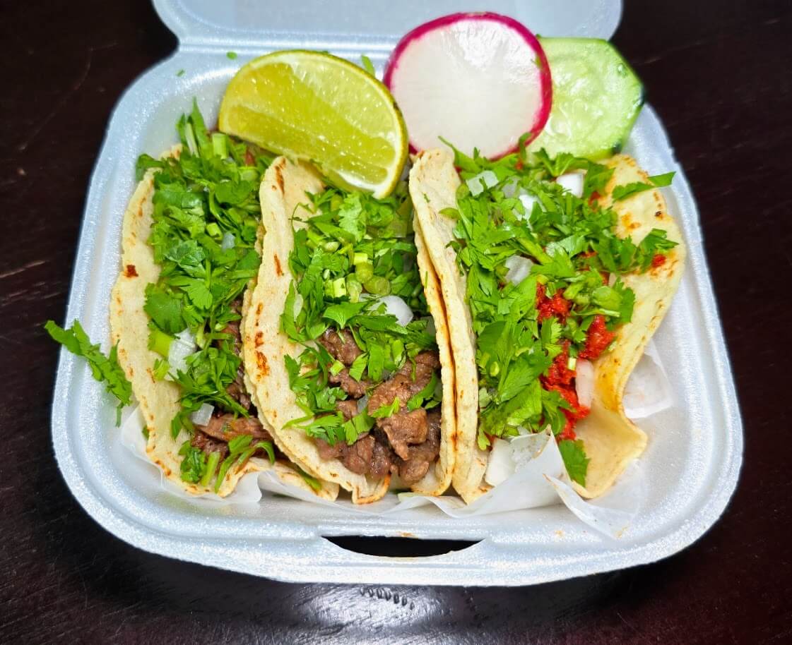 Traditional tacos with your choice of protein on housemade corn tortillas (thicker than average), topped with onions and cilantro. 