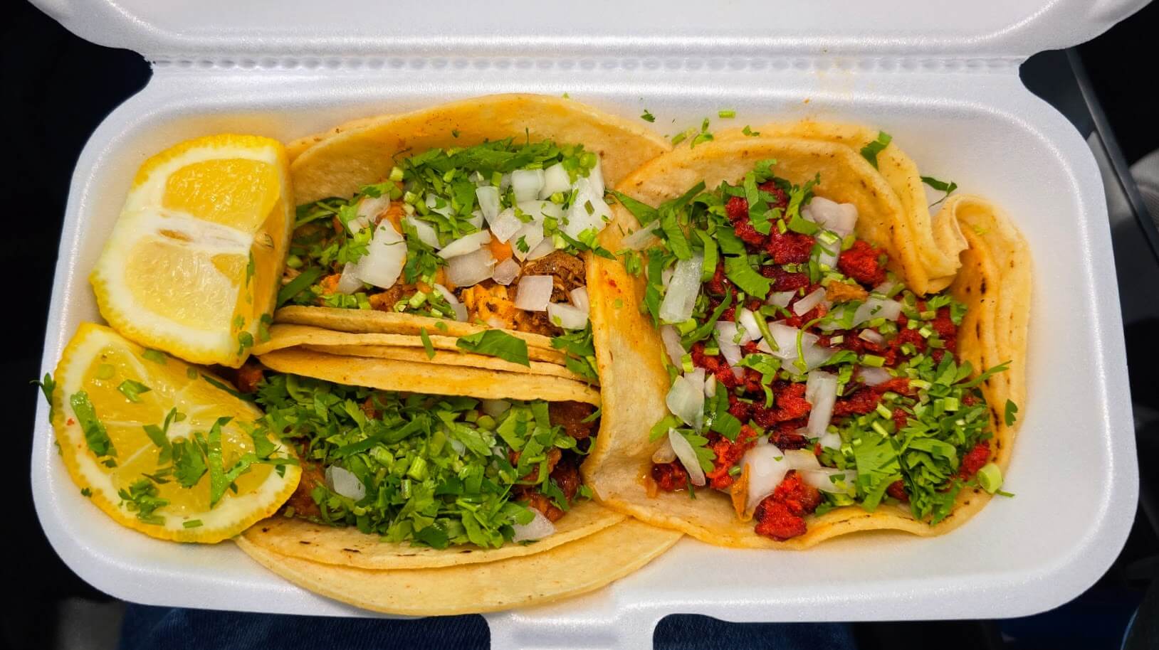 Traditional tacos with your choice of protein on corn tortillas, topped with onions and cilantro.