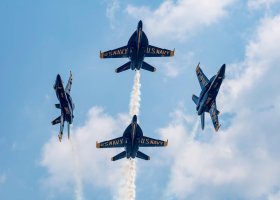 four Blue Angels flying overhead and performing at the Vero Beach Airshow. Feat the Blue Angles.